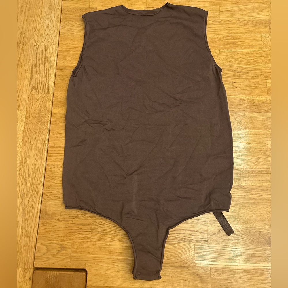 SKIMS Sleeveless Scoop-Back Bodysuit in Dark Brown